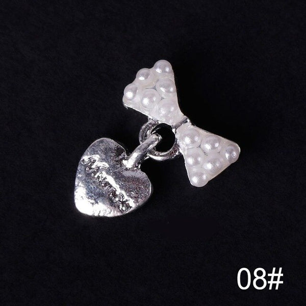1 pièces 3D Nail Art décorations arc Design 28 Style paillettes strass alliage accessoires goujons pour ongles #277845