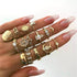 products/12-Pcs-set-Bohemian-Vintage-Crown-Water-Drops-Stars-Geometric-Crystal-Ring-Set-Women-Charm-Joint.jpg_640x640_0ddc4ca7-84bc-4501-a10f-b2d4fa3e5803.jpg