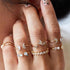 products/12-Pcs-set-Bohemian-Vintage-Crown-Water-Drops-Stars-Geometric-Crystal-Ring-Set-Women-Charm-Joint.jpg_640x640_4b57128b-7845-4d95-876e-66ed6b7d68ab.jpg