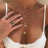 products/26-styles-Women-Fashion-Moon-Star-Geometry-Gems-Cross-Pendant-Multilayer-Necklace-Bohemian-Clavicle-Chain-Short.jpg_640x640_84359e2d-0559-45cc-84c9-251cfccb40de.jpg